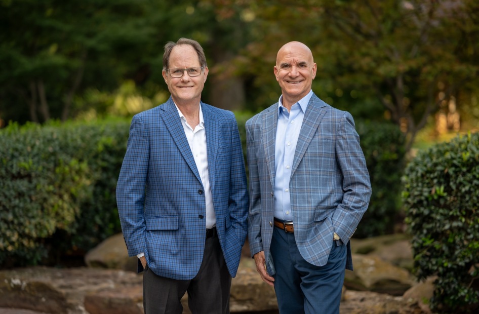 Performance Properties two staff members side by side