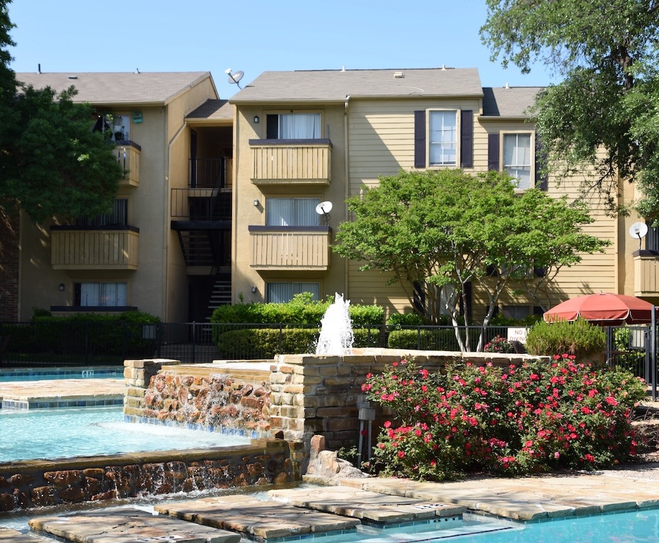 pool with nearby reclining seats and outside courtyard areas