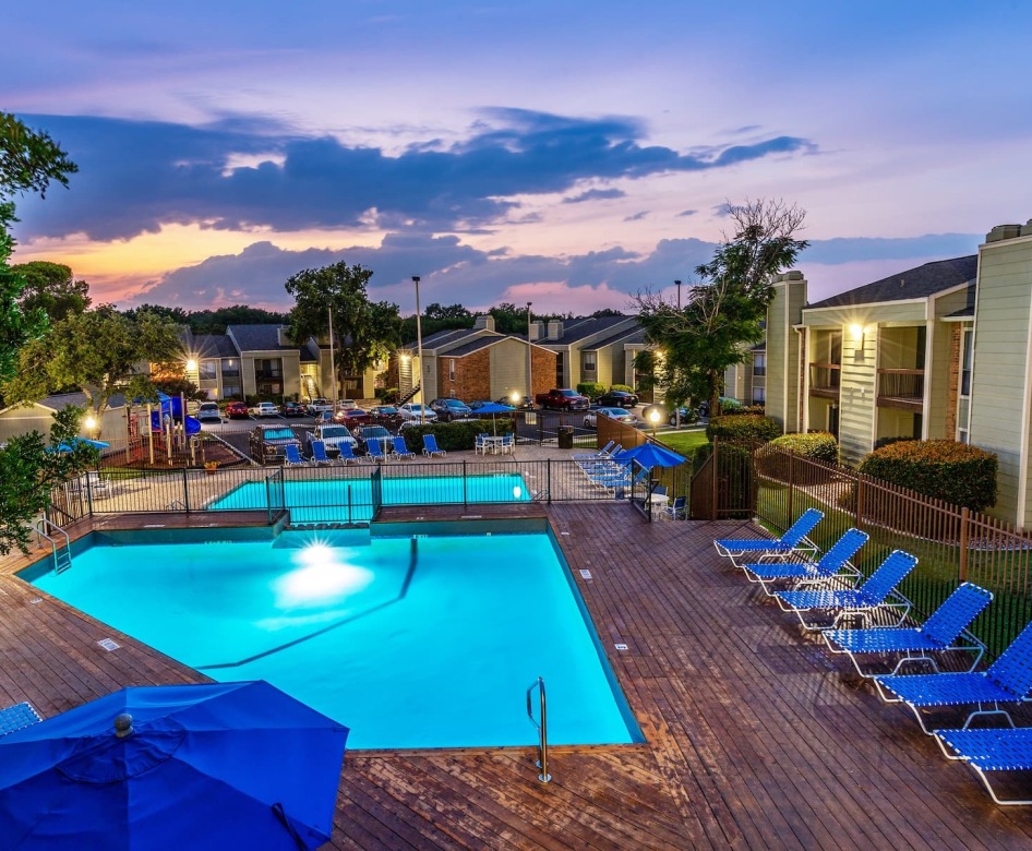 pool with nearby reclining seats and outside courtyard areas