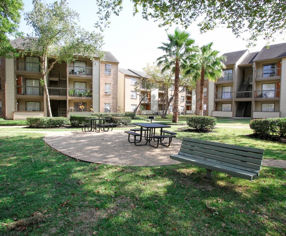 exterior showing green paths and outdoor seating